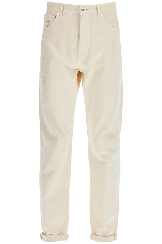 Brunello Cucinelli destroyed leisure fit jeans with distressed details.